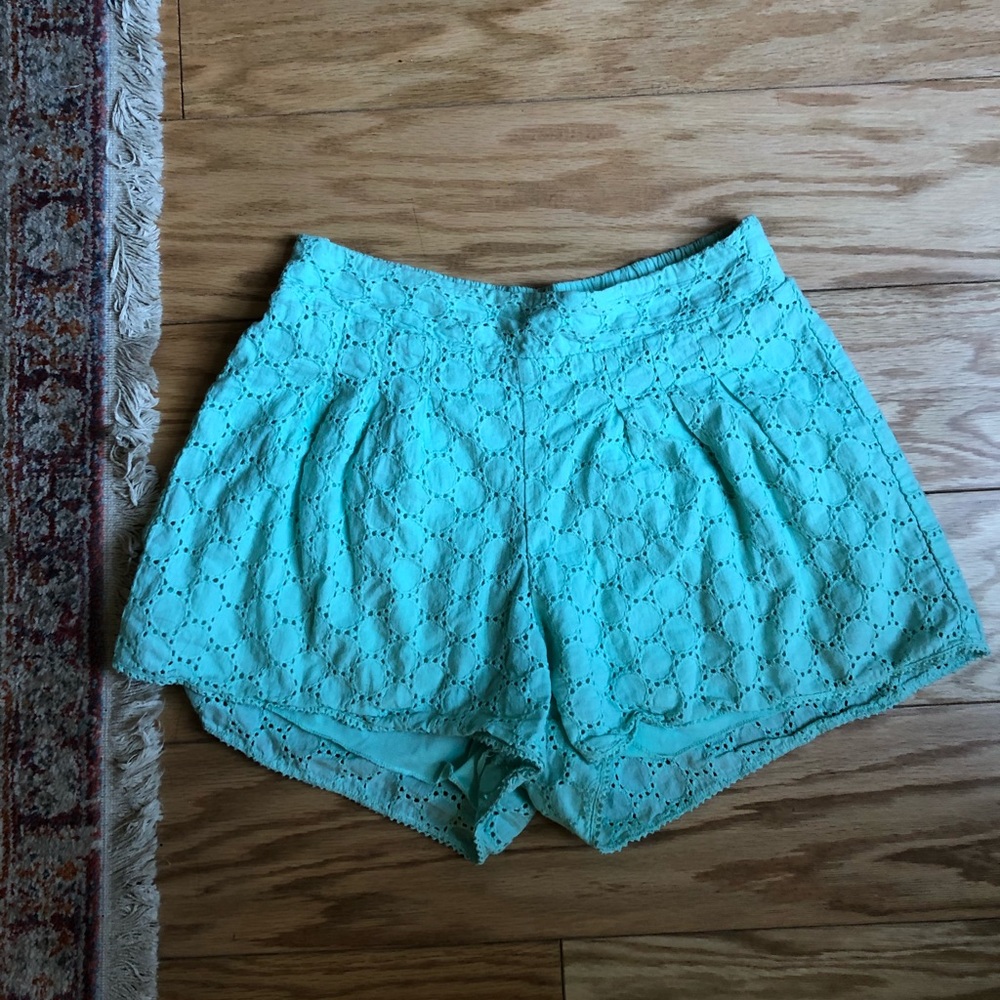 Boutique eyelet high waisted shorts